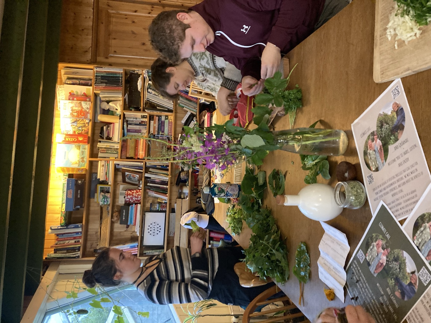 Preparing freshly picked greens and herbs together at Gróandi